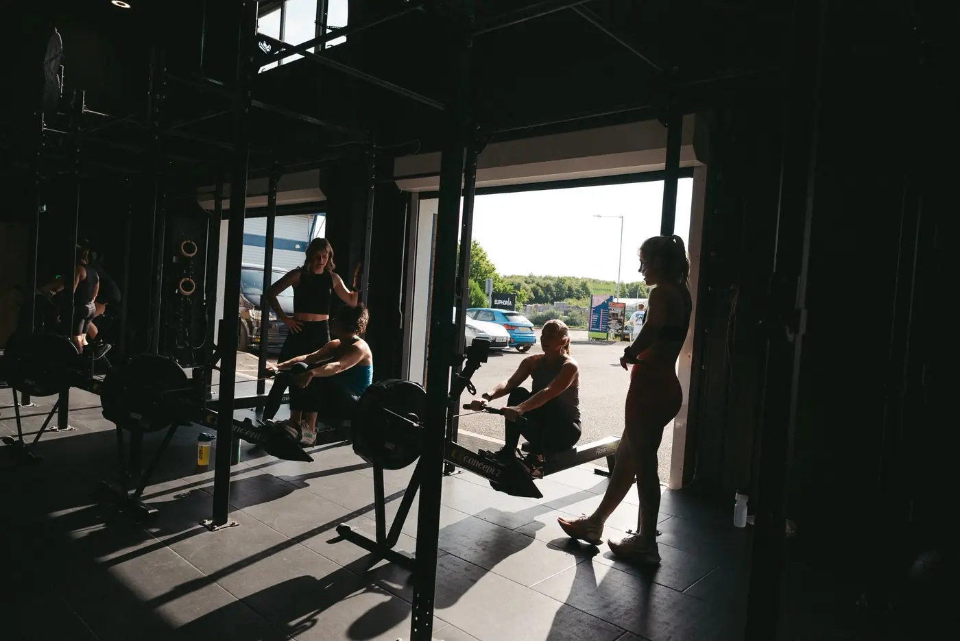 Members rowing by the open roller door at Euphoria in Whitfield, Dover
