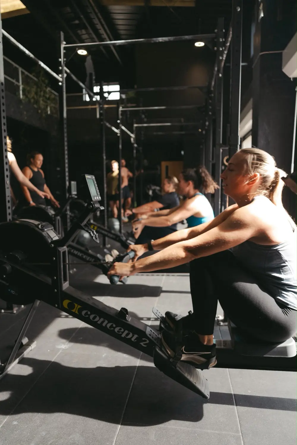 Members rowing side by side
